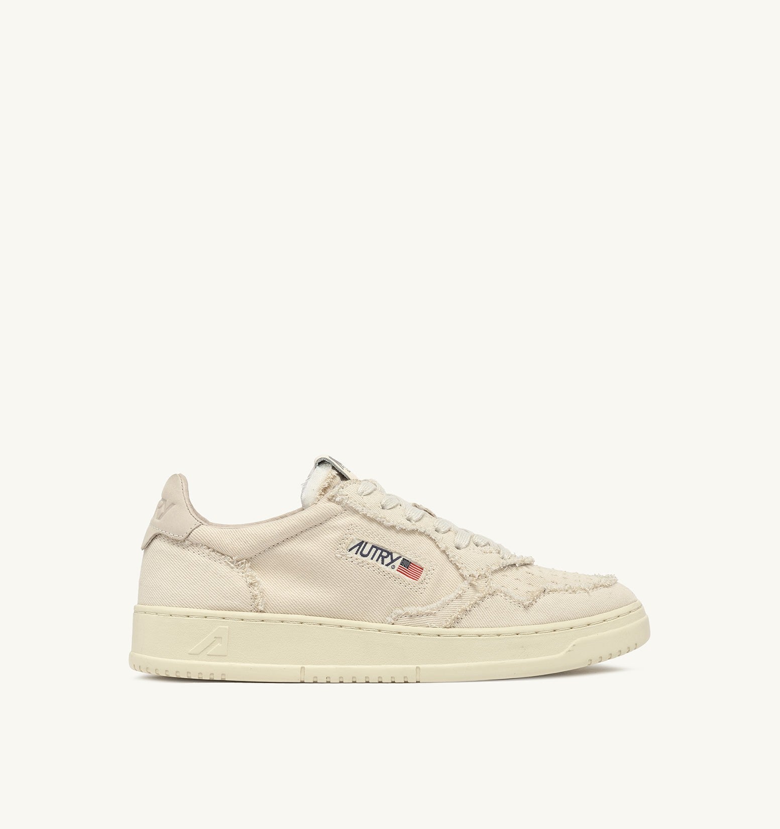 MEDALIST LOW SNEAKERS IN IVORY DENIM